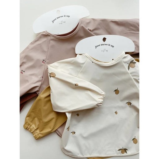 Dinner Bibs with Sleeves - Pack of 2 - Miso Raindrops/Turbulence par Konges Sløjd - Cape Bibs with Sleeves | Jourès Canada