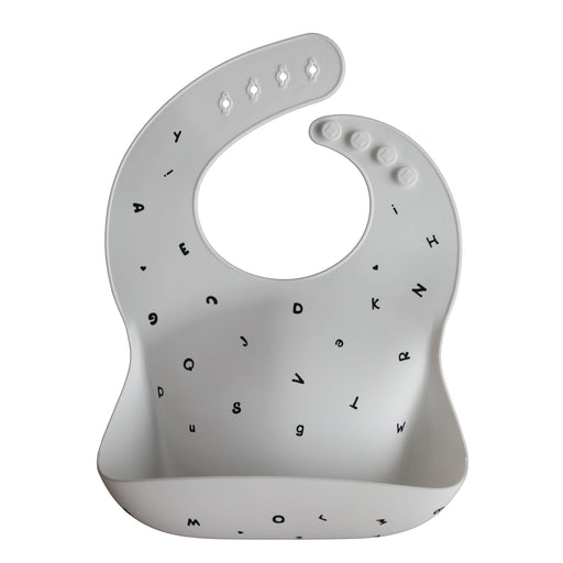 Adjustable waterproof silicone Baby Bib - Letters White par Mushie - Baby | Jourès Canada